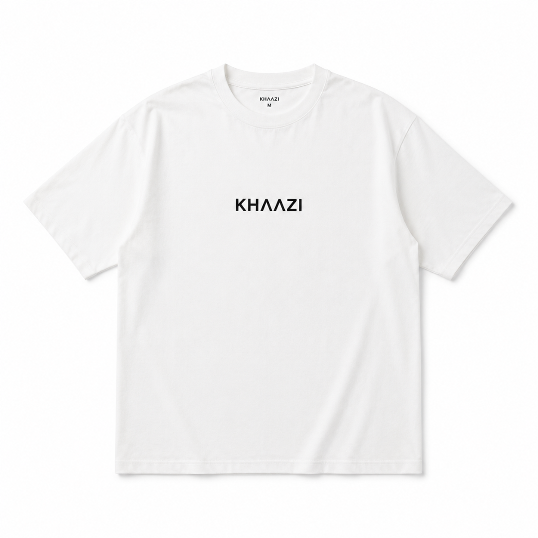 Khaazi women's white crew neck t-shirt with logo print, featuring a relaxed fit and minimalist casual design, styled in a modern studio setting.