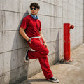 Men's red co-ord set – branded trouser and t shirt in Pakistan by Khaazi